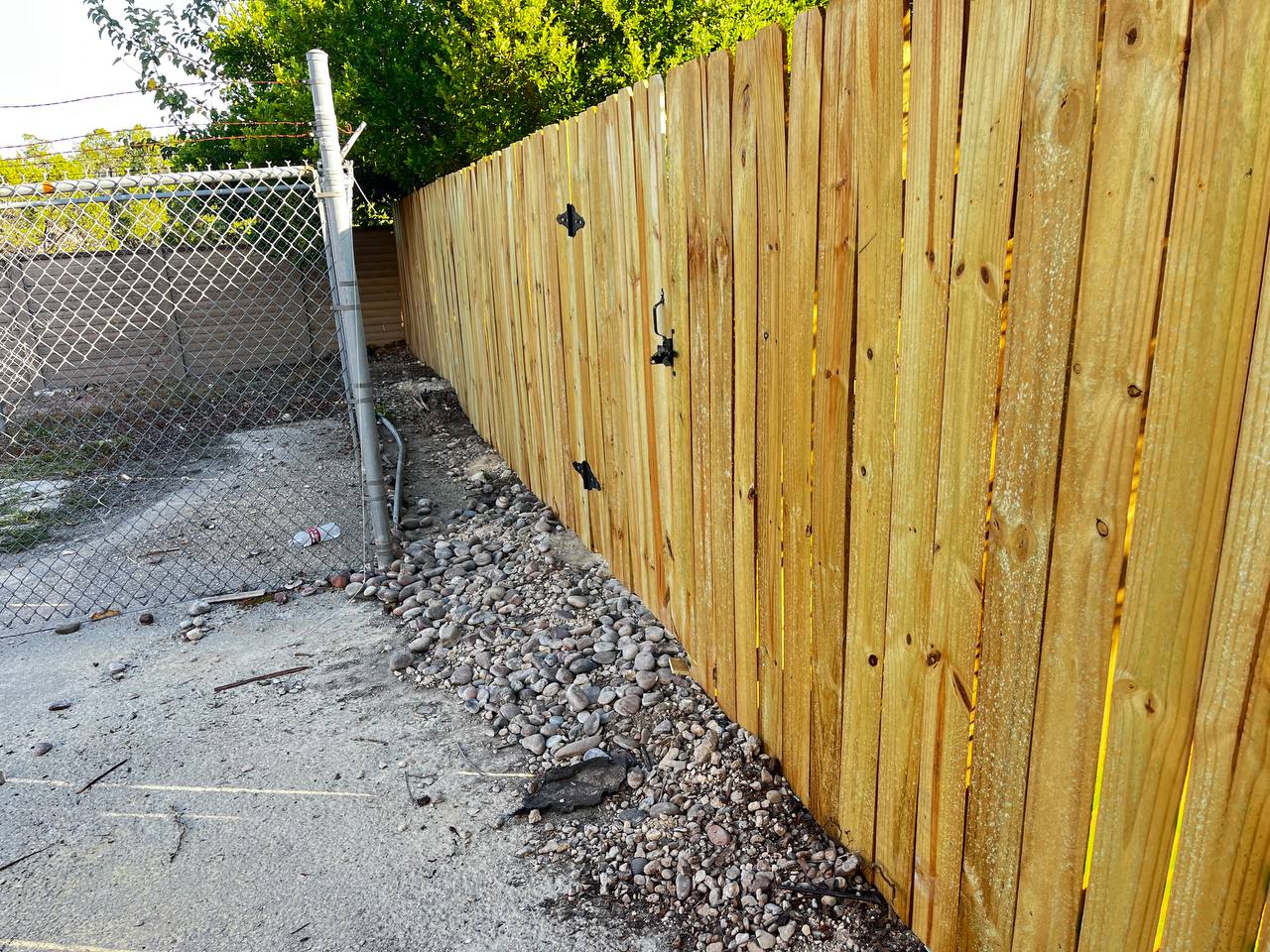 New pressure-treated pine privacy fence with gate Cedar Park TX