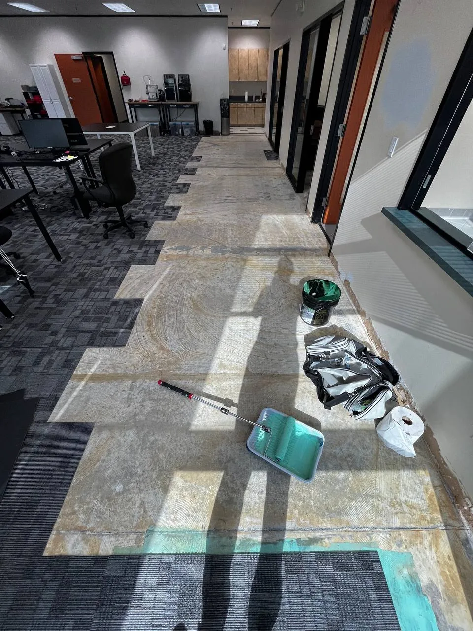 Commercial carpet tile installation before